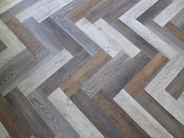 Luxury Vinyl Planks in Herringbone Pattern