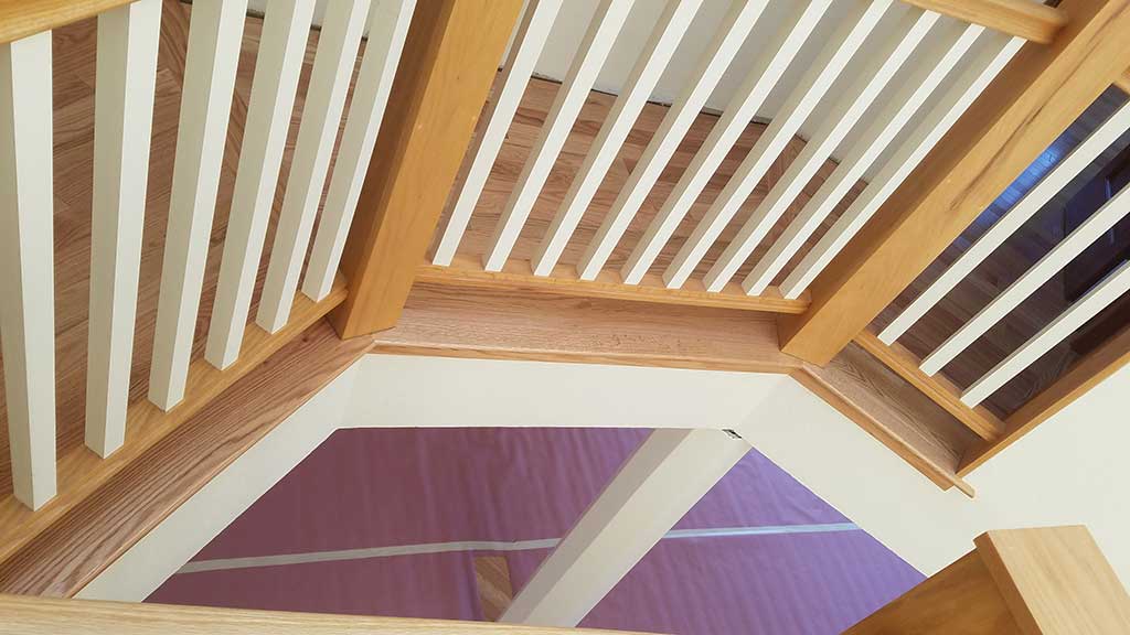 Hardwood Flooring Corner Bannister in a Los Gatos Home