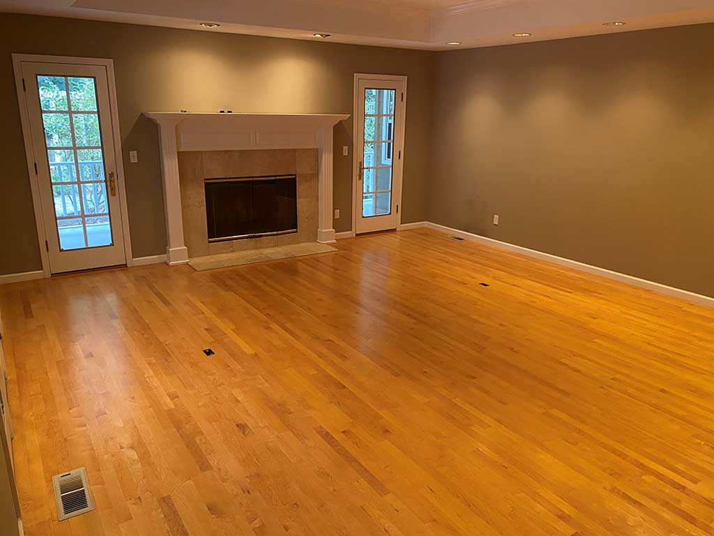 Living Room in Santa Cruz Home Before Hardwood Floor Restoration