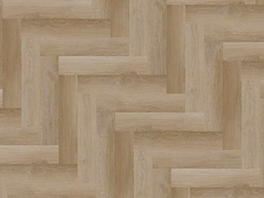 A sample of Gaia Floors’ Red Series Dolce Luna stone polymer composite luxury vinyl planks arranged in a herringbone pattern.