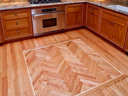Custom hardwood inlay design in kitchen