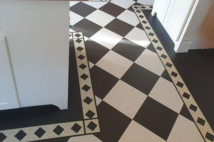 forbo marmoleum linoleum black white checkerboard diamond border 
